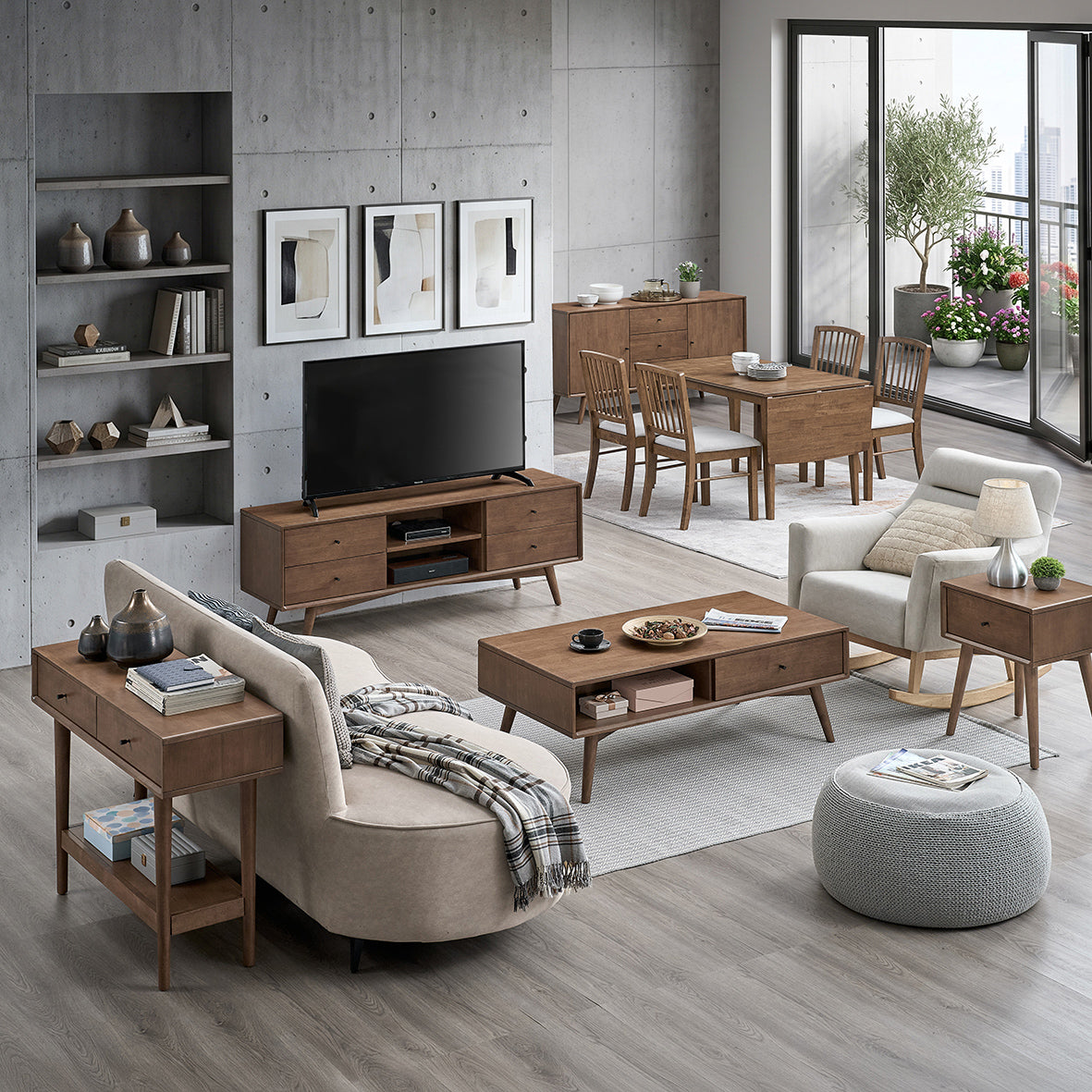 Coordinated brown wood-tone furniture across a dining area and living room