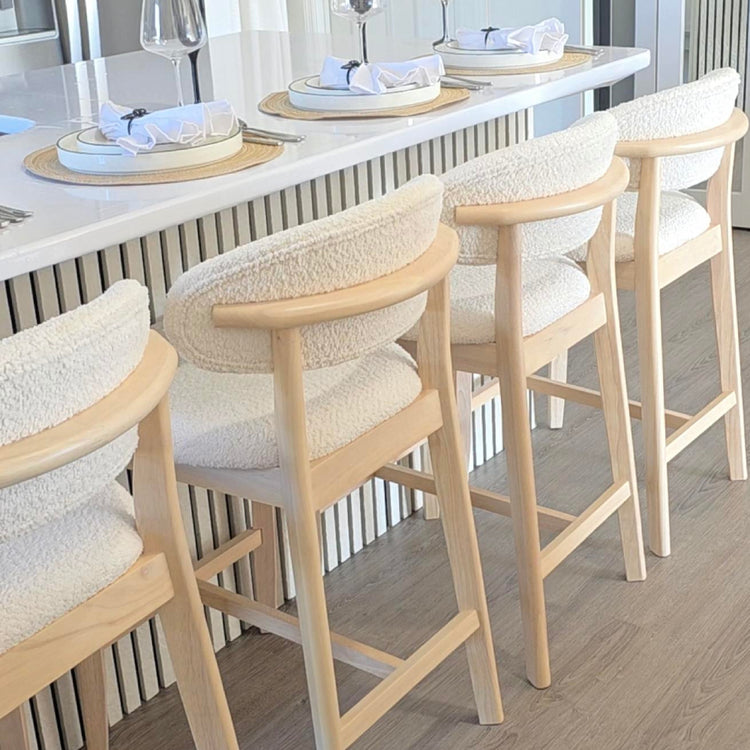 ACTU 807 set of two 26-inch upholstered counter stools beside a kitchen island