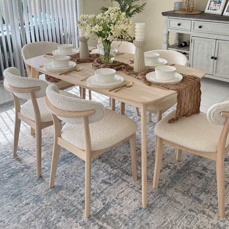 ACTU 805 Scandinavian dining set with upholstered chairs in a small dining room