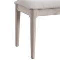 ACTU 823 Dining Bench; White Wash; close-up of seat frame and tapered legs