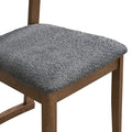 ACTU 827 Dining Chairs; Walnut; close-up of gray textured seat upholstery and frame