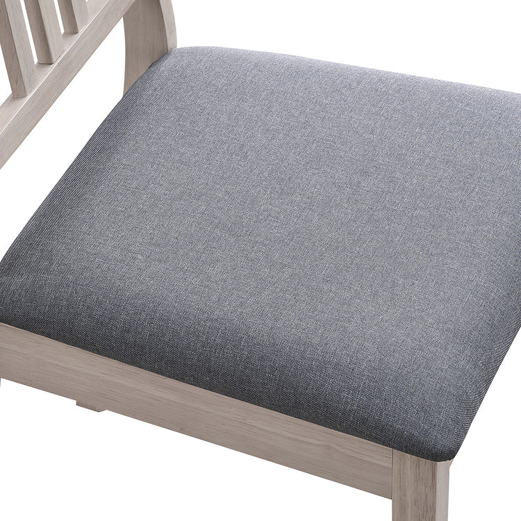 ACTU 828 Dining Chairs; White Wash; close-up of gray upholstered seat