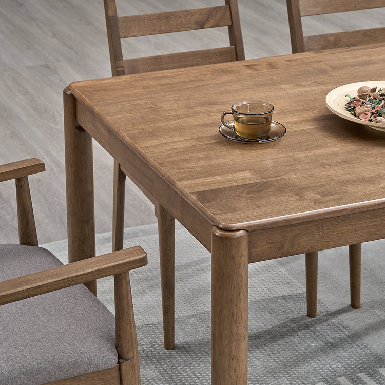 ACTU 823 Walnut tabletop detail; chairs and decorative accessories not included