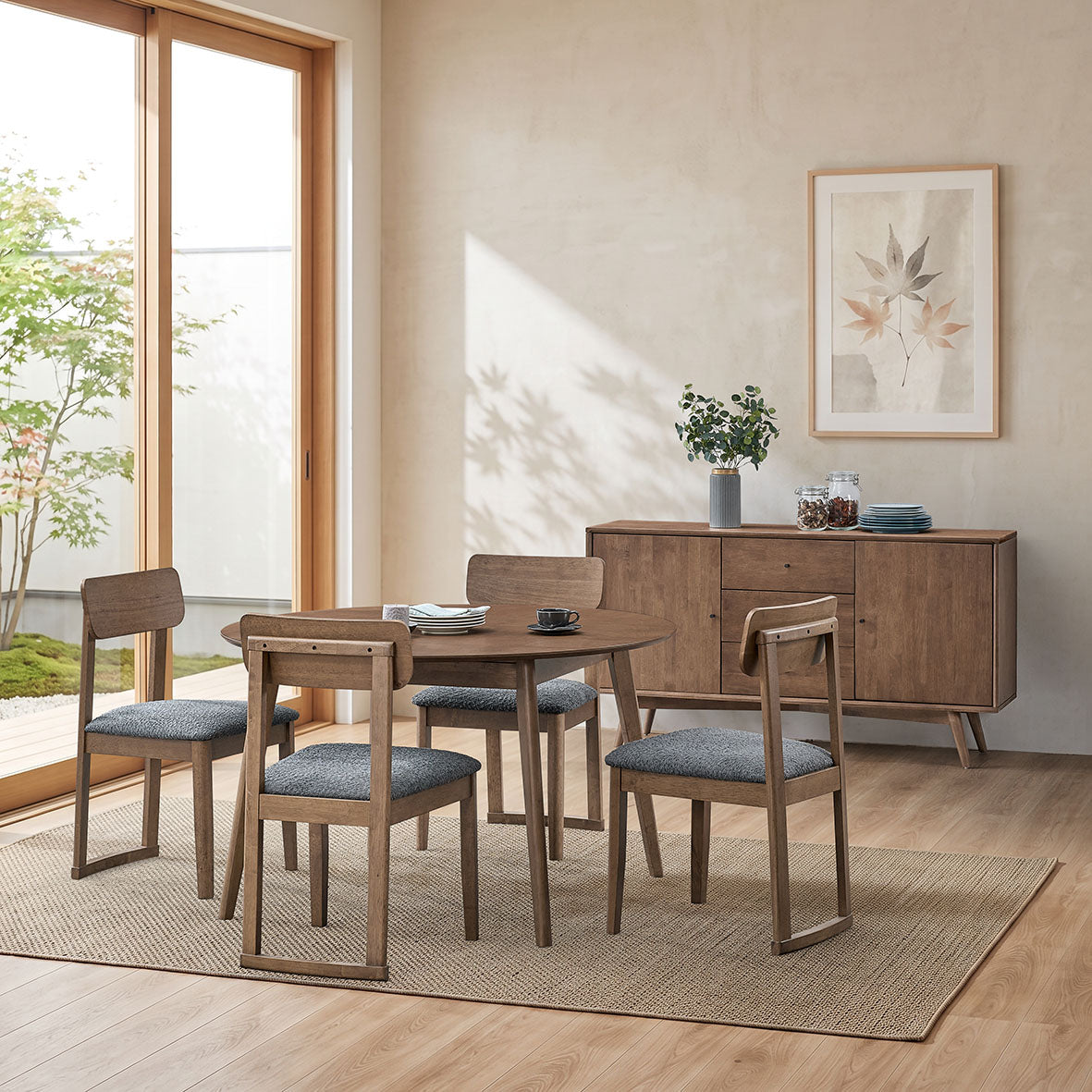 ACTU 827 dining set and 901 sideboard, photographed in Walnut