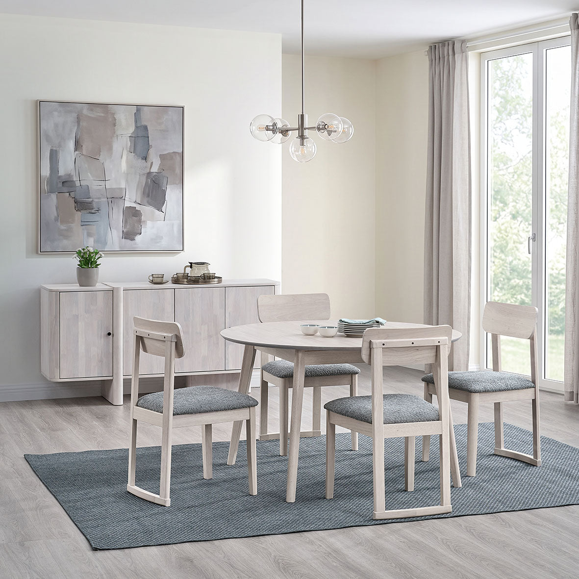 ACTU 827 dining set and 907 sideboard, photographed in White Wash