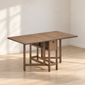 ACTU Nolan 833 Walnut drop-leaf dining table in a room setting, table only