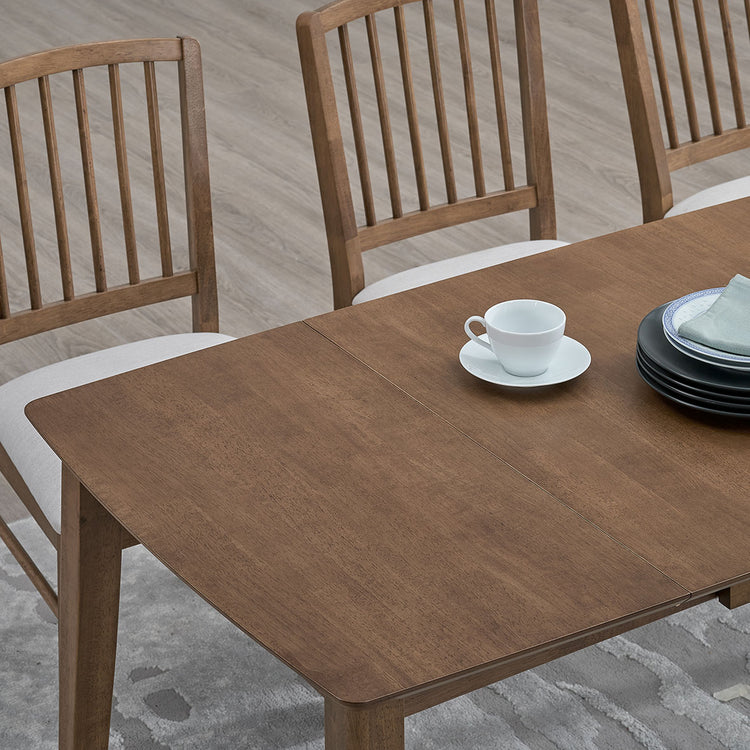 ACTU 824 Drop-Leaf Dining Set, 4 Chairs; Walnut; close-up of tabletop leaf seam and rounded corner