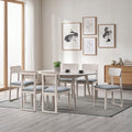 ACTU 827 table in White Wash, shown with 6 chairs
