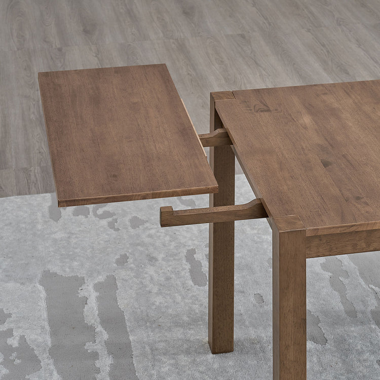 ACTU 831 Extendable Dining Set, 4 Chairs; Walnut; close-up of end extension leaf and exposed support rails