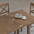 ACTU 822 Dining Table; Walnut; close-up of tabletop hinges and wood-grain surface; chairs not included