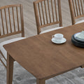 ACTU 824 Drop-Leaf Dining Table; Walnut; close-up of tabletop leaf seam and rounded corner; chairs not included