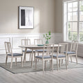 ACTU 828 table in White Wash, shown with 6 chairs; chairs not included
